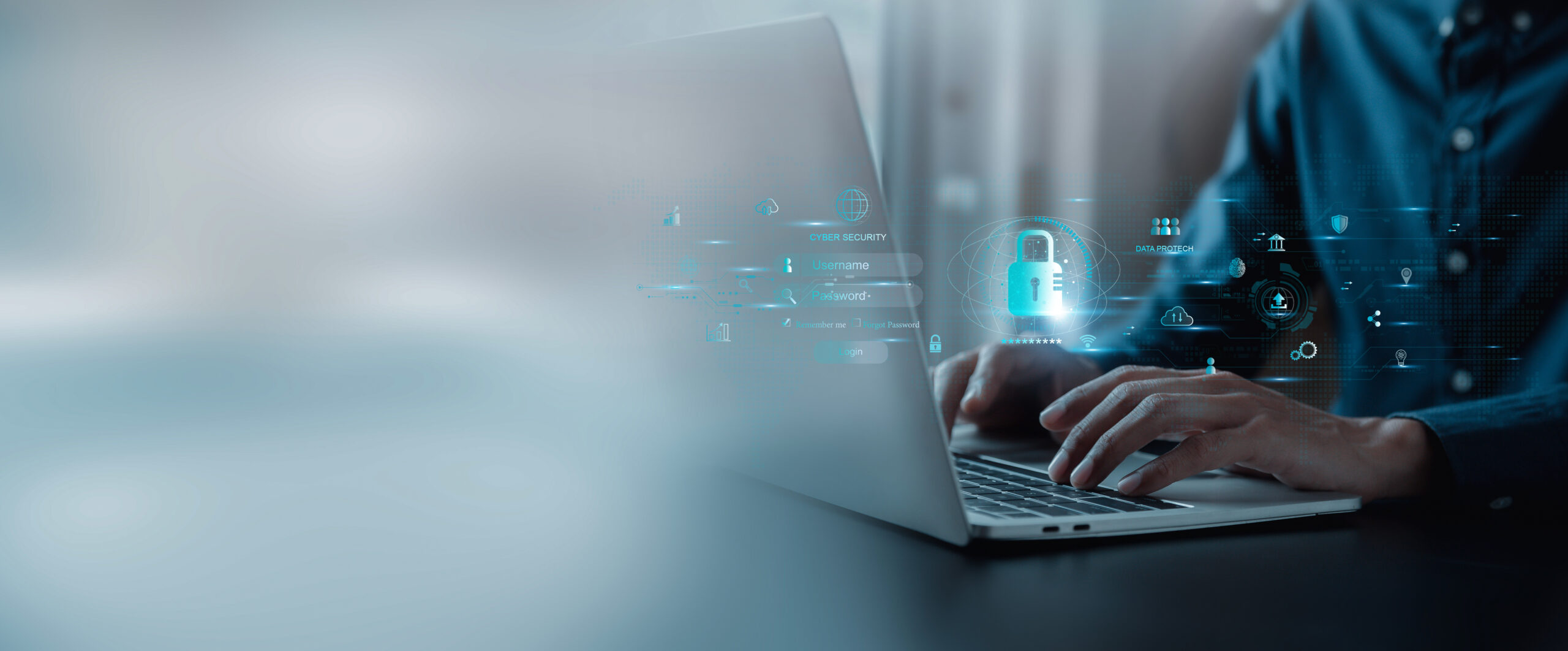 Arbeit am Laptop mit Schloss-Icon als Symbol für Geoblocking.